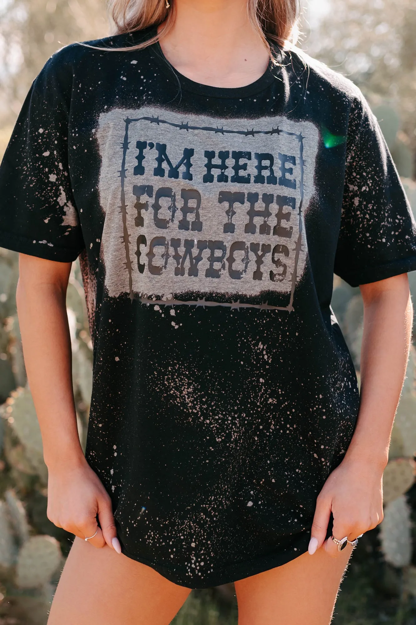 "I'm Here For The Cowboys" Bleached Graphic T-Shirt (Black) - Print On Demand