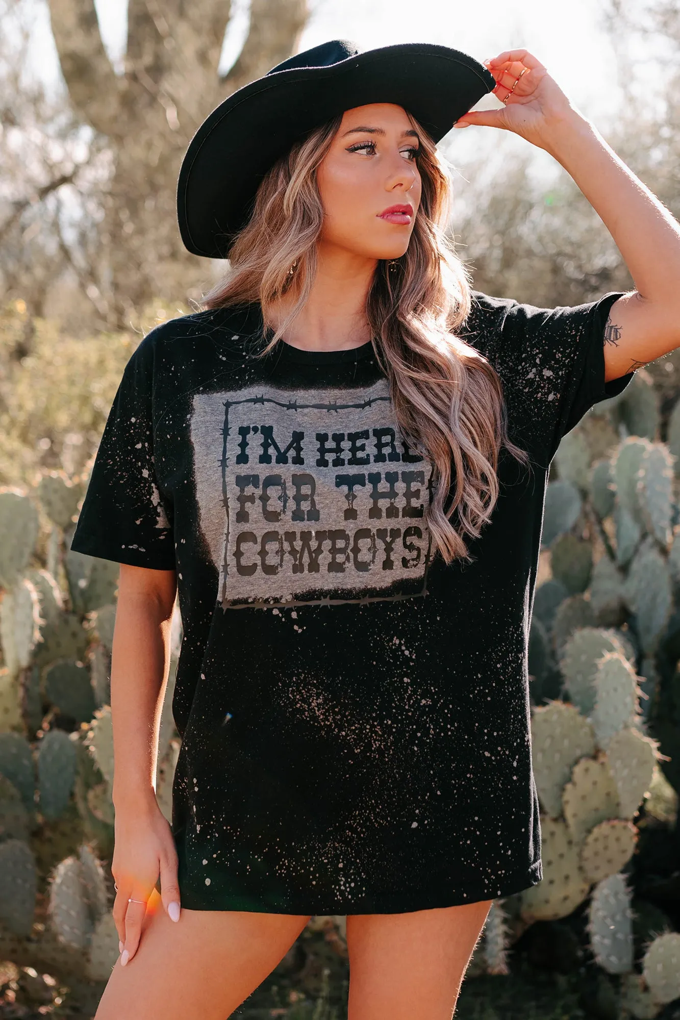 "I'm Here For The Cowboys" Bleached Graphic T-Shirt (Black) - Print On Demand